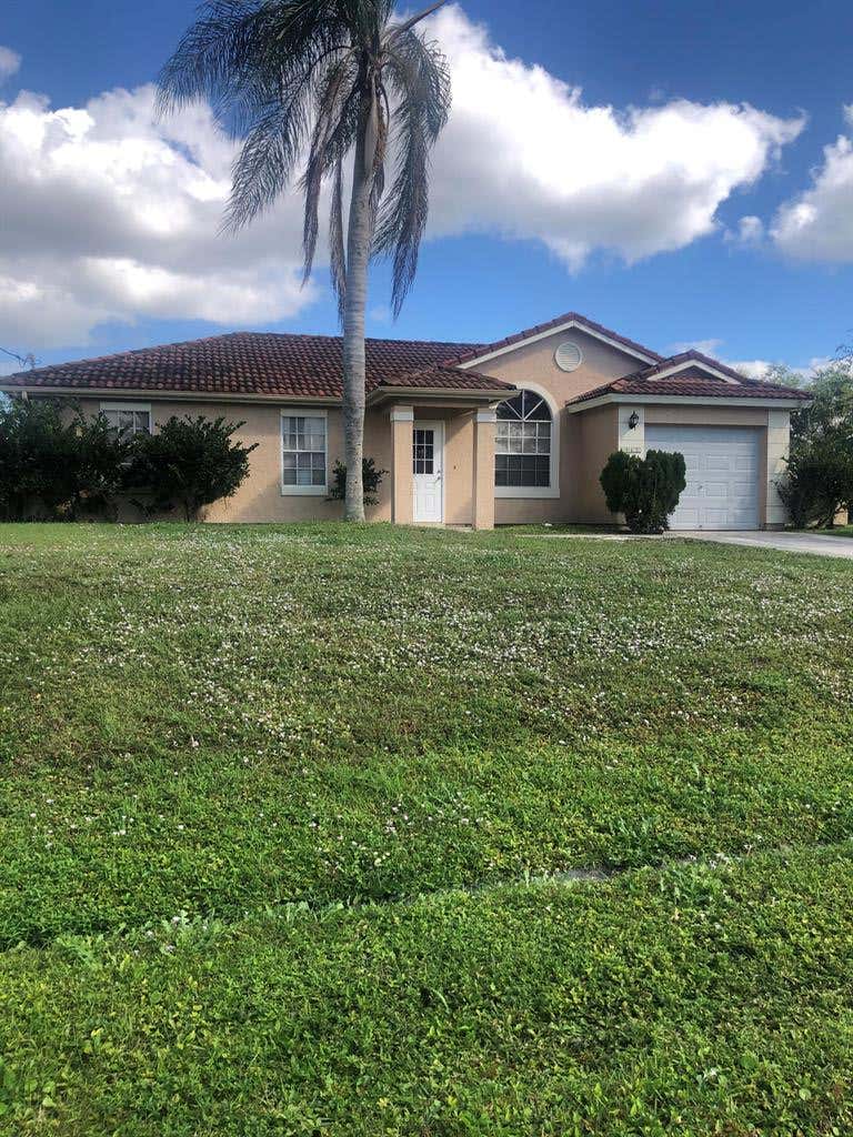 Photo of 2855 SW Ann Arbor Road, Port Saint Lucie, FL 34953 (MLS # R10766853)