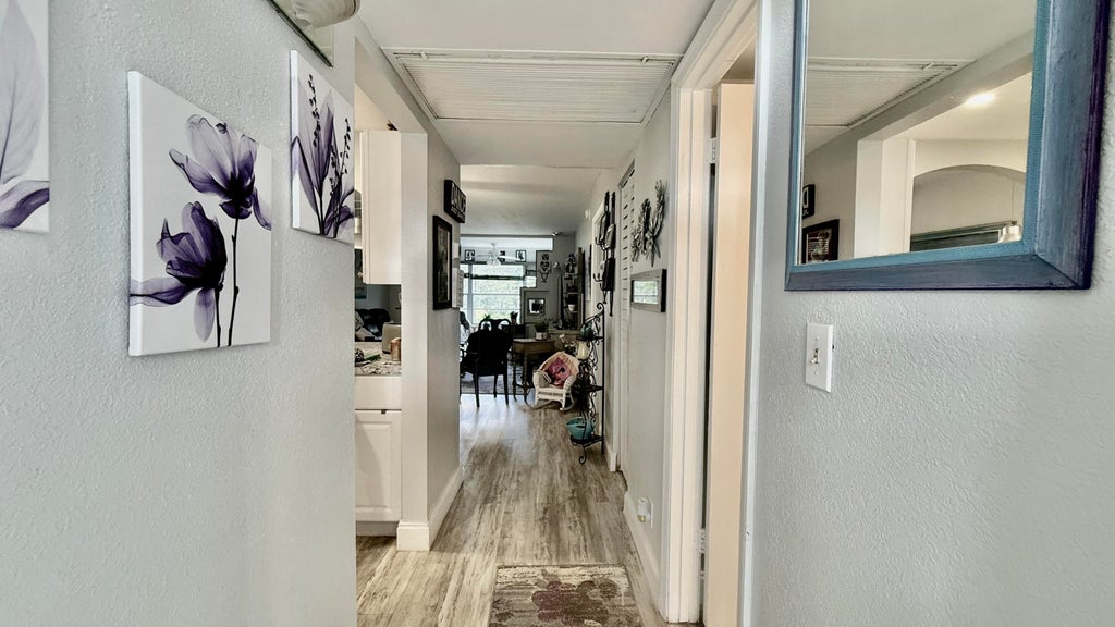 Photo of 9480 Poinciana Place #201, Davie, FL 33324 (MLS # B26069467)