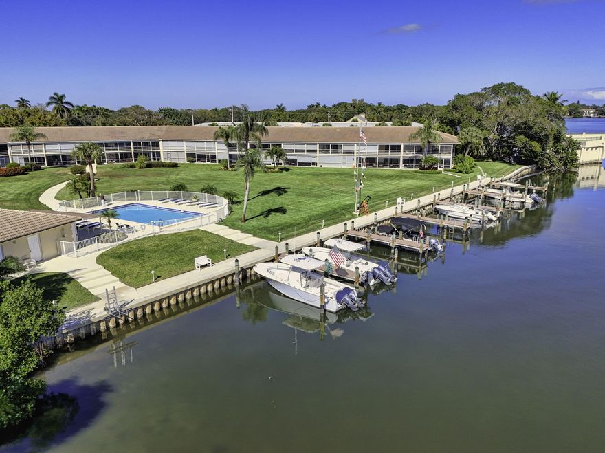 A truly unique opportunity and a boaters paradise in Tequesta!  TWO condo units combined to form this 1,500sf, 3 bedroom, 4 bath waterfront residence at Whitehall, offering stunning River views & endless possibilities!  Relax on the TWO screened lanais & enjoy the spectacular water view of the Loxahatchee River with private dockage for 30' boats for owners on a first come basis for $300/yr! Currently no waiting list & no fixed bridges with direct ocean access.  Paddle boards & kayaks welcome!  Whitehall is a hidden gem; 55+ waterfront community; 32 condos, docks, pool, lovely grounds & within walking distance of Tequesta village center's  quaint shops & restaurants.  A unique opportunity to live on the water with your boat in your own back yard.  Parking #10 & #11. COMING SOON: ELEVATOR!!