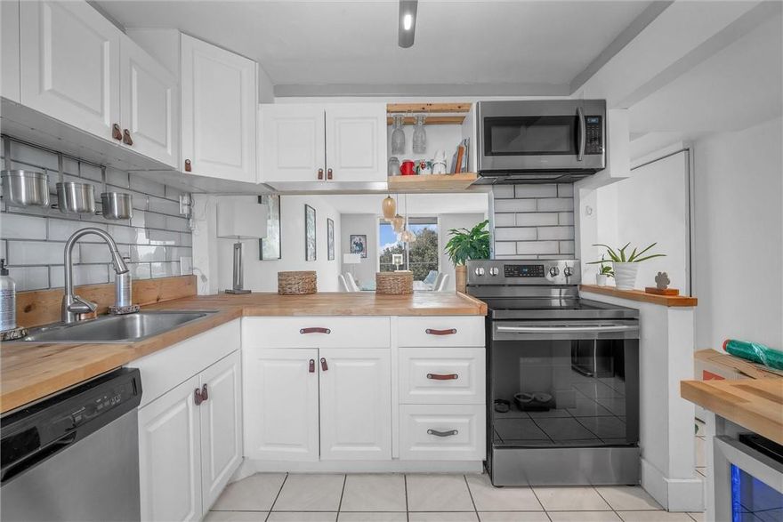 Minutes to beaches, Downtown Delray, FAU, Town Center Mall, I-95, Mizner Park, restaurants & so much more. This corner unit offers tons of natural light in each room. Relax on your screen porch enjoying gorgeous sunsets on the golf course. Open floorplan, new wood floor throughout, impact windows & doors, W&D combo unit inside unit, new kitchen w/ white shaker cabinets, butcher block countertops and stainless-steel appliances. 3rd bedroom could be left open to extend the living area. New bathrooms, Master with walk in closet & bathroom with dual sinks! New breaker panel & water heater! Hoa offers high speed internet, cable, pest control, water & sewer. Enjoy the club house, community pool & tennis course. A+ schools. 25% down for financing. Partial reserve