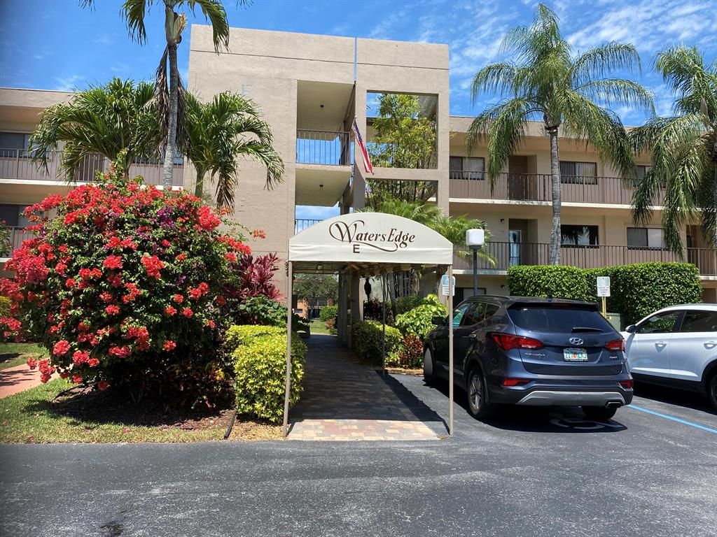 Photo of 5550 Witney Drive #205, Delray Beach, FL 33484 (MLS # R10719969)