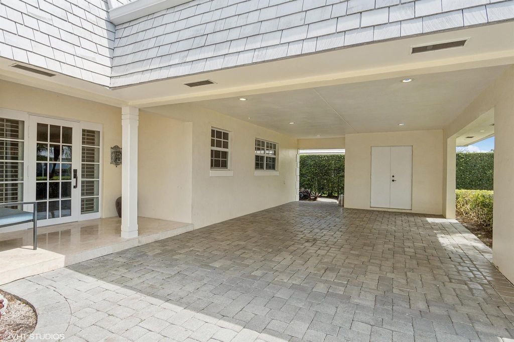 Photo of 371 Villa Drive S, Atlantis, FL 33462 (MLS # R10975248)