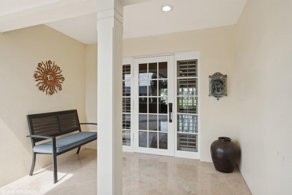 Photo of 371 Villa Drive S, Atlantis, FL 33462 (MLS # R10975248)