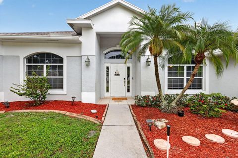 Photo of 1571 SW Hunnicut Avenue, Port Saint Lucie, FL 34953 (MLS # B26037225)