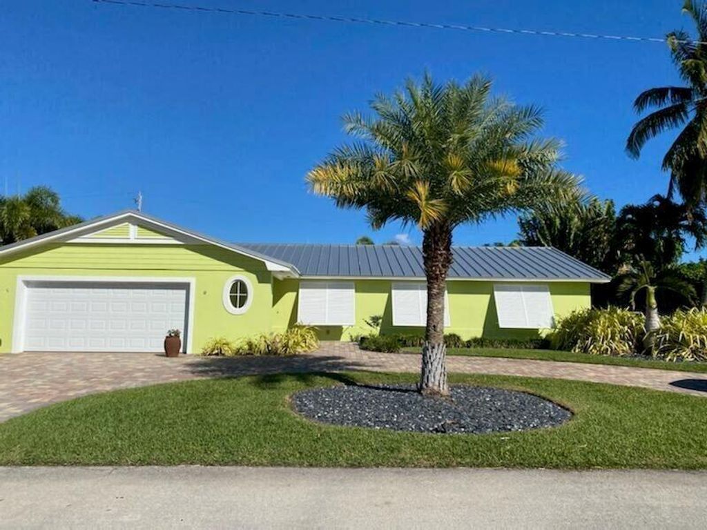 Photo of 1150 Emerald Lane, Singer Island, FL 33404 (MLS # R11074135)