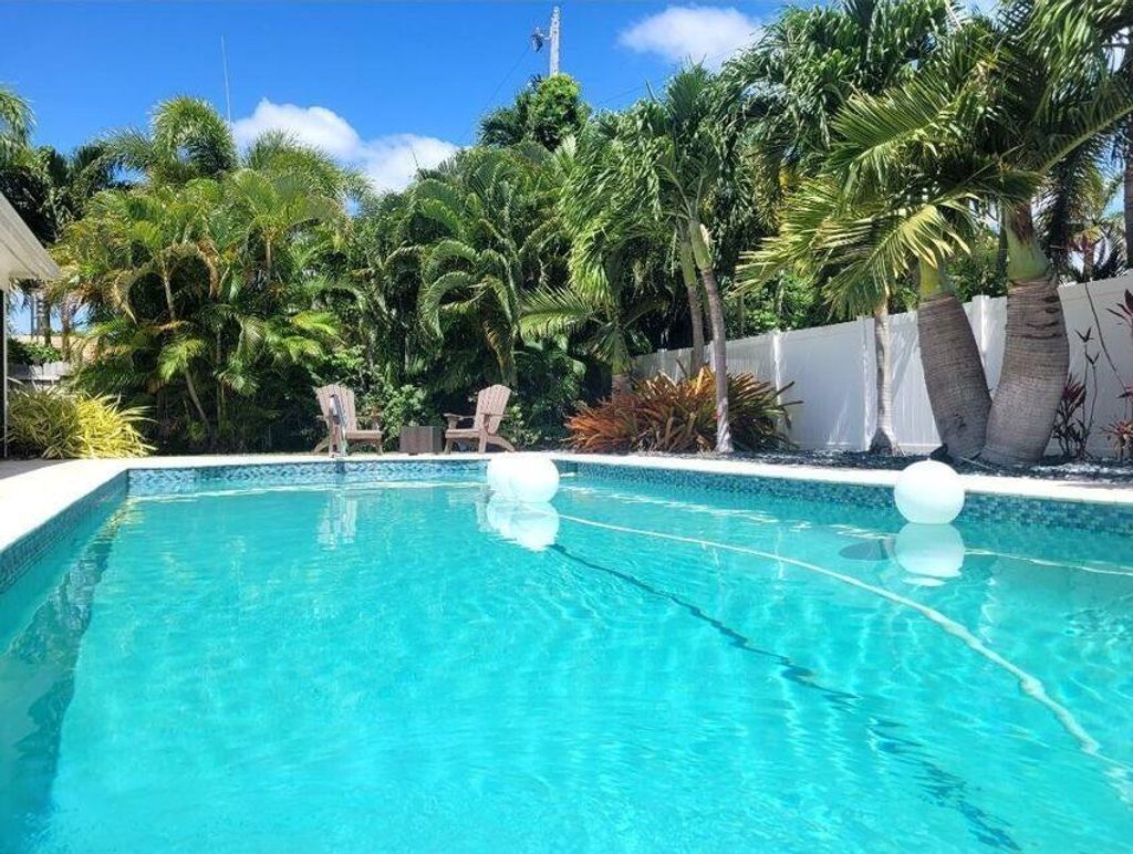 Photo of 1150 Emerald Lane, Singer Island, FL 33404 (MLS # R11074135)