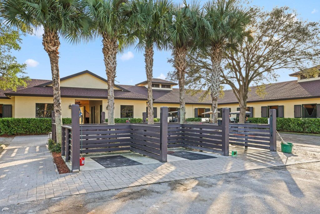 Photo of 4980 Stables Way, Wellington, FL 33414 (MLS # R11148068)