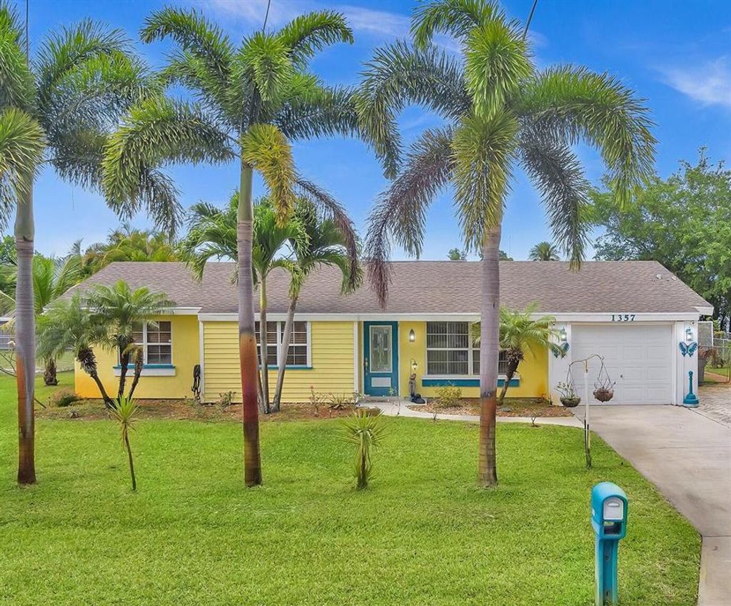 Photo of 1357 SE Oakmont Lane Ln, Port St Lucie, FL 34952 (MLS # R10797767)