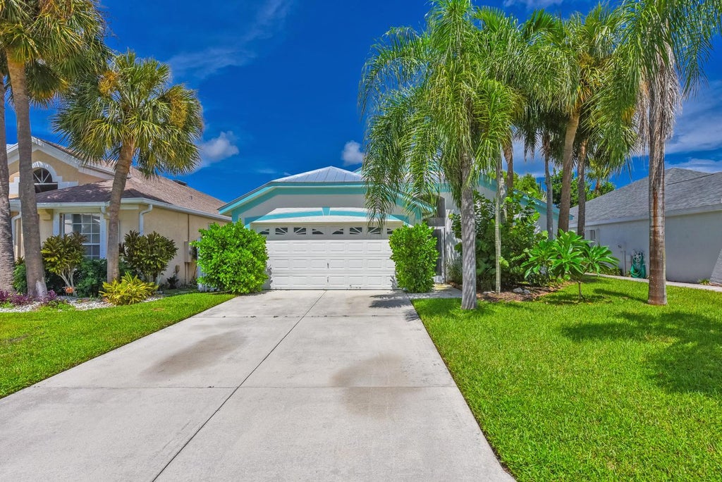Photo of 713 NW Waterlily Place, Jensen Beach, FL 34957 (MLS # B26079098)