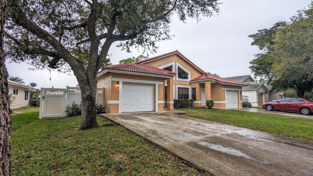 Photo of 3193 NW 118 Drive, Coral Springs, FL 33065 (MLS # R11063718)