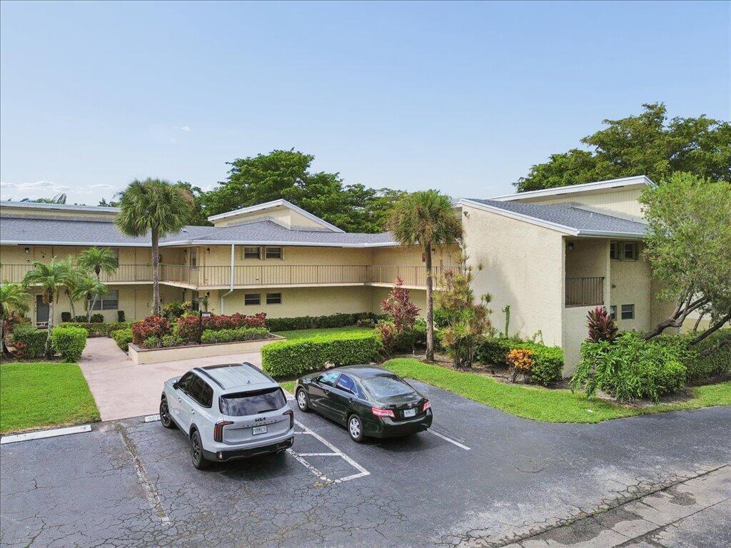 Photo of 8791 HOLLY Court #103, Tamarac, FL 33321 (MLS # B26094816)