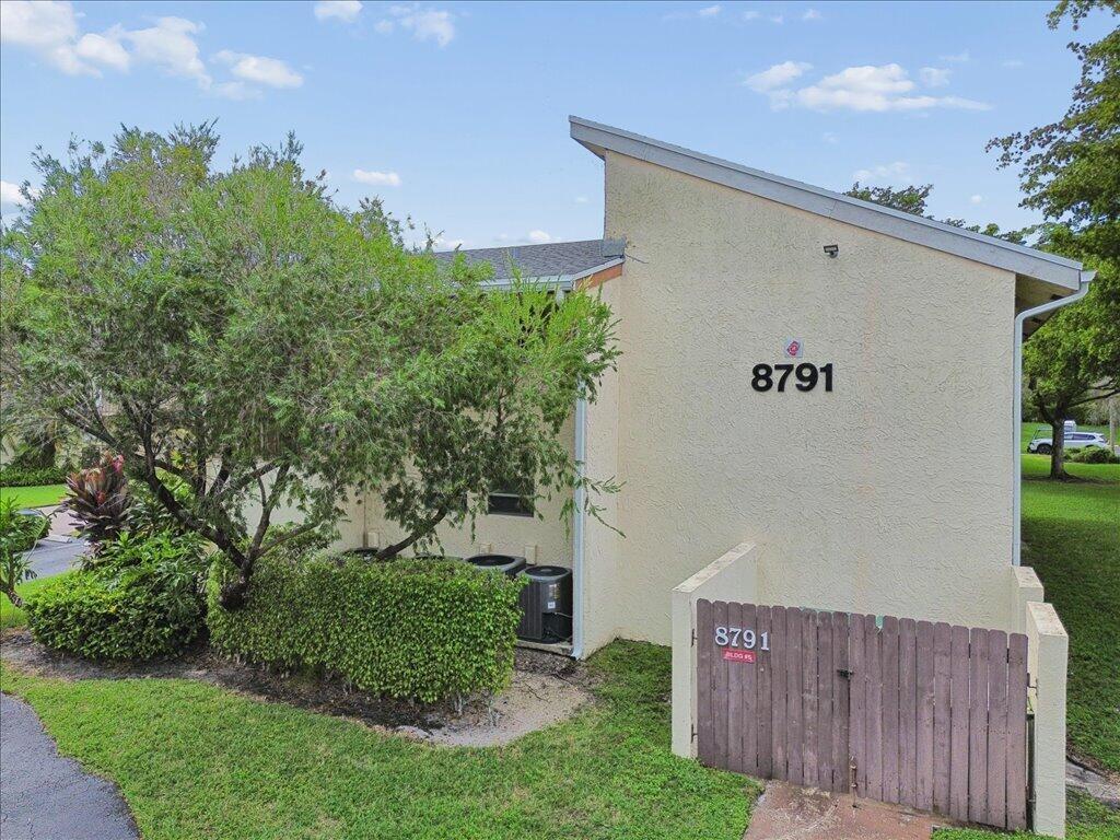 Photo of 8791 HOLLY Court #103, Tamarac, FL 33321 (MLS # B26094816)