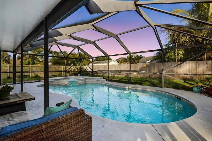 Discover your own private oasis in this beautifully renovated home. A modern kitchen with granite counters, stainless-steel appliances and open layout set the stage for entertaining, while the primary suite offers a serene walk-in shower and the guest bath features a deep soaking tub. Spend your days in the sunroom or by the screened-in pool and spa, surrounded by a fully fenced backyard. With a newer washer/dryer, plenty of room for your RV or boat, and a location just minutes from Downtown Fort Pierce, Hutchinson Island Beaches, and St. Lucie West shopping and restaurants, this home has it all. Offered unfurnished annually with pool care included or furnished seasonally with all utilities included for $4,800 monthly.