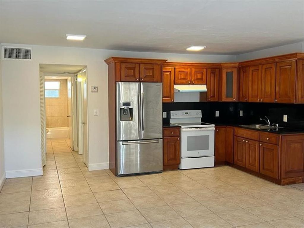 Photo of 7851 Dunham Boulevard #4, Miami, FL 33138 (MLS # F10549965)