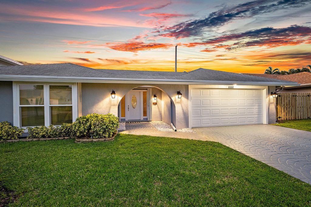 Photo of 1115 Rainwood Circle W, Palm Beach Gardens, FL 33410 (MLS # R10897198)