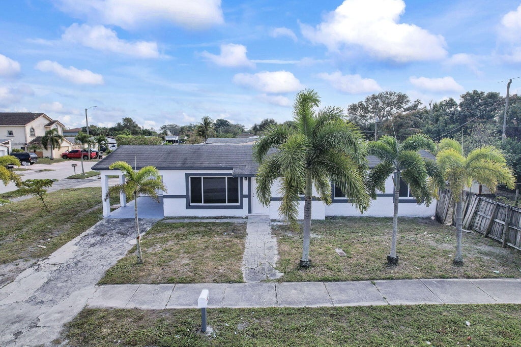 Photo of 240 NW 5th Street, Deerfield Beach, FL 33441 (MLS # R11057633)