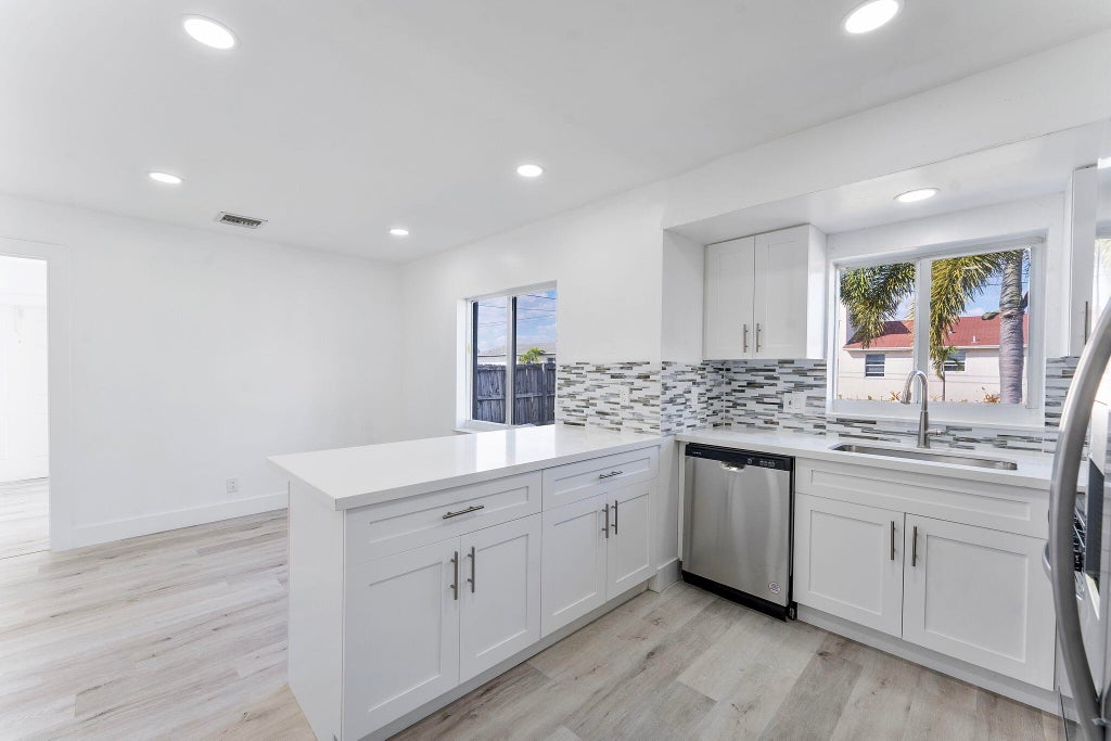 Photo of 240 NW 5th Street, Deerfield Beach, FL 33441 (MLS # R11057633)