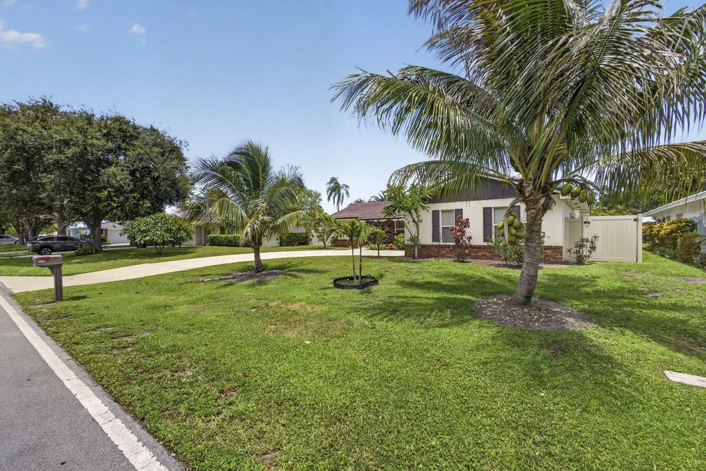 Photo of 9860 Honeysuckle Avenue, Palm Beach Gardens, FL 33410 (MLS # B26049697)