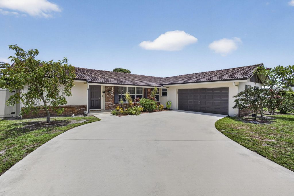 Photo of 9860 Honeysuckle Avenue, Palm Beach Gardens, FL 33410 (MLS # B26049697)