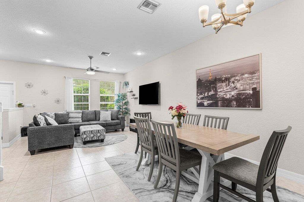 Photo of 212 W Thatch Palm Circle, Jupiter, FL 33458 (MLS # R11122469)