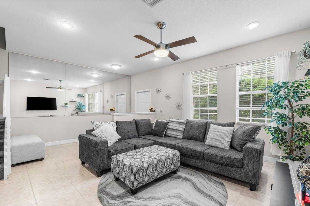 Photo of 212 W Thatch Palm Circle, Jupiter, FL 33458 (MLS # R11122469)