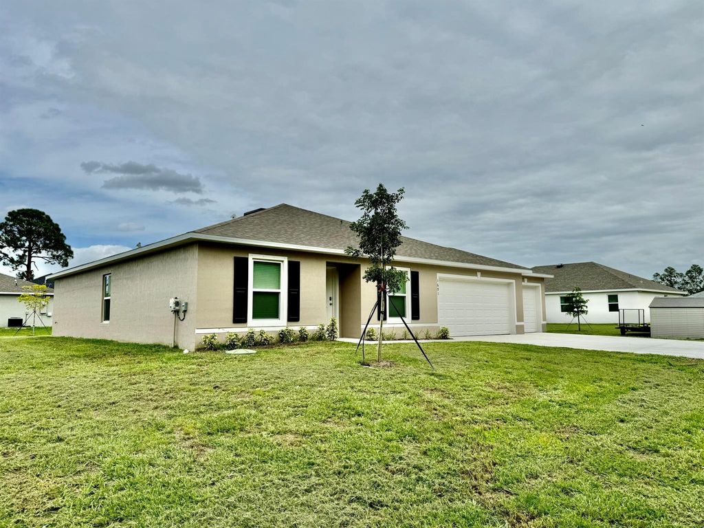 Photo of 1691 SW Andalusia Road, Port Saint Lucie, FL 34953 (MLS # R11030191)