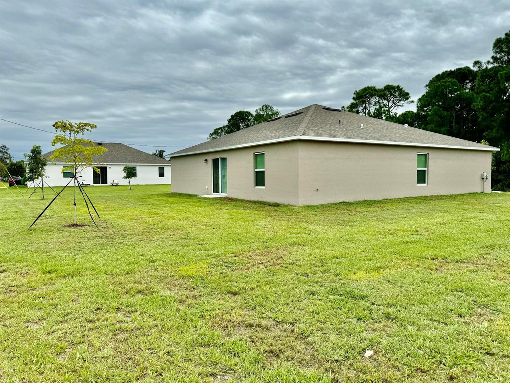 Photo of 1691 SW Andalusia Road, Port Saint Lucie, FL 34953 (MLS # R11030191)