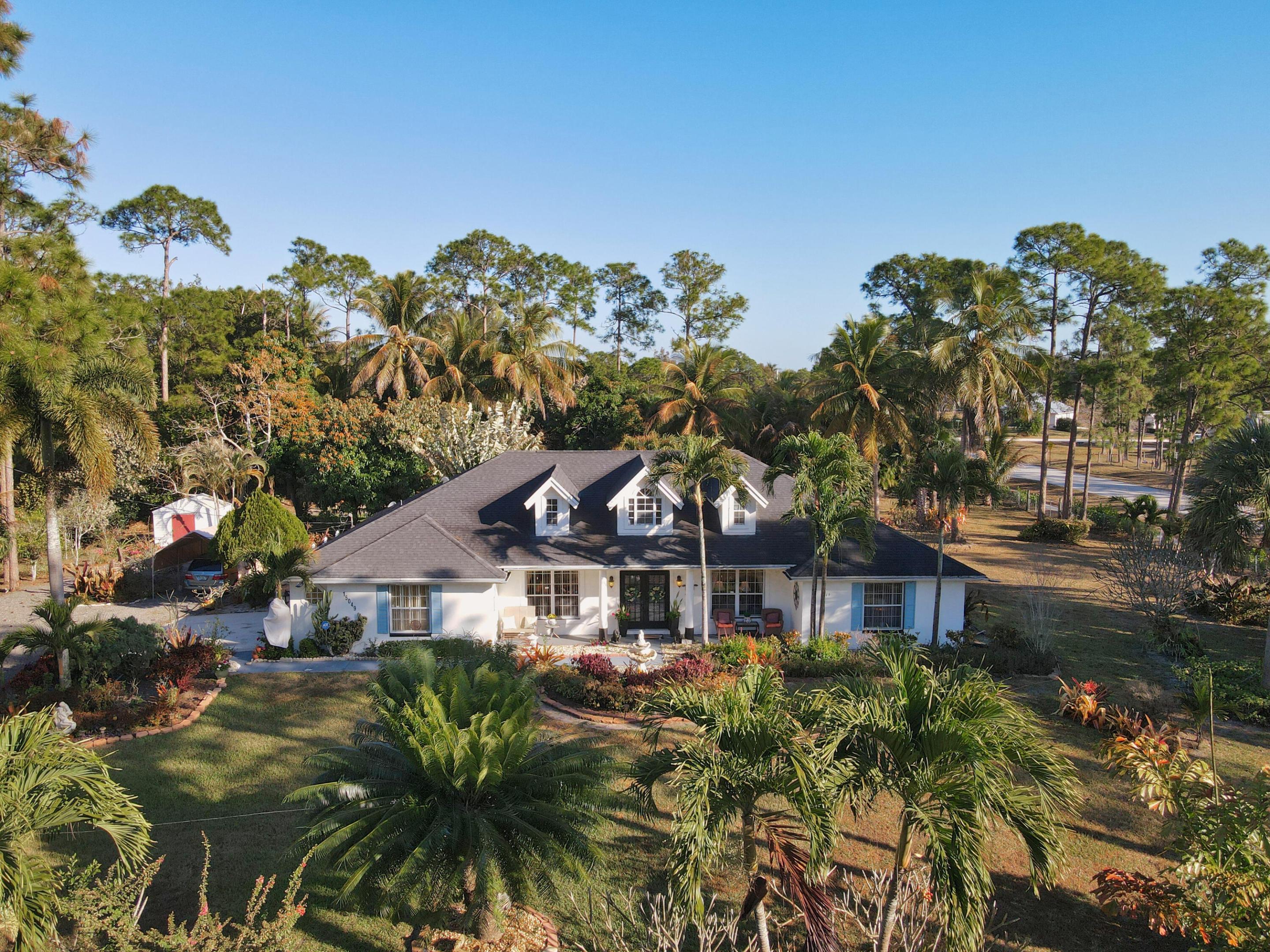 Photo 1 of 58 — 15049 85th Road N, Loxahatchee, FL 33470