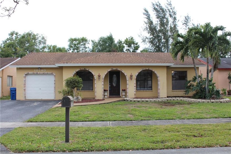 Beautifully Updated 4/2 Private Waterfront Views with a pool. Spacious House with Vaulted Ceilings. New tile through, Updated Kitchen with Stainless Steel Appliances, Updated baths,Open floor plan,Serene views from the backyard on a private canal NO back  neighbor! Desirable West Sunrise area, A+ Elementary school.  Newer roof, new pool pump, Very well maintained home!