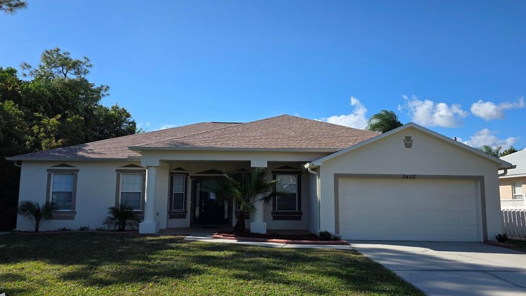 Photo of 2466 SW Mercer Street, Port Saint Lucie, FL 34984 (MLS # R11149537)