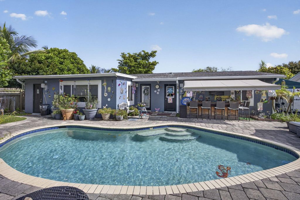 Photo of 240 GREGORY Road, West Palm Beach, FL 33405 (MLS # B26053905)
