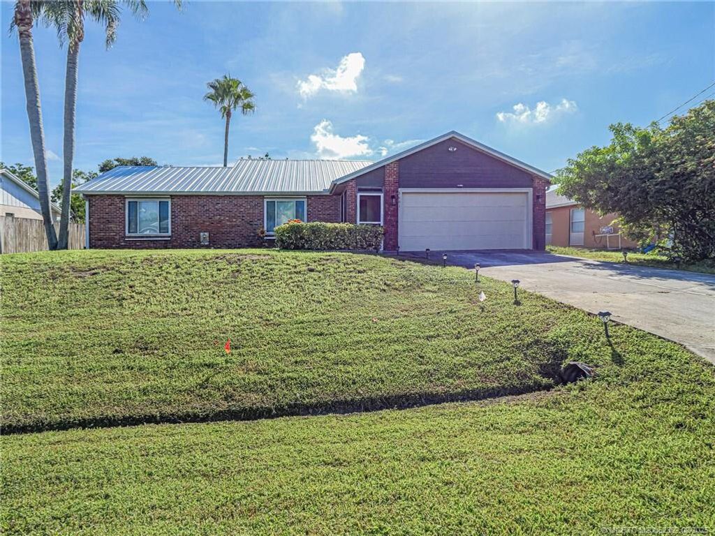 Photo of 3601 SW Voyager Street, Port Saint Lucie, FL 34953 (MLS # R11138122)