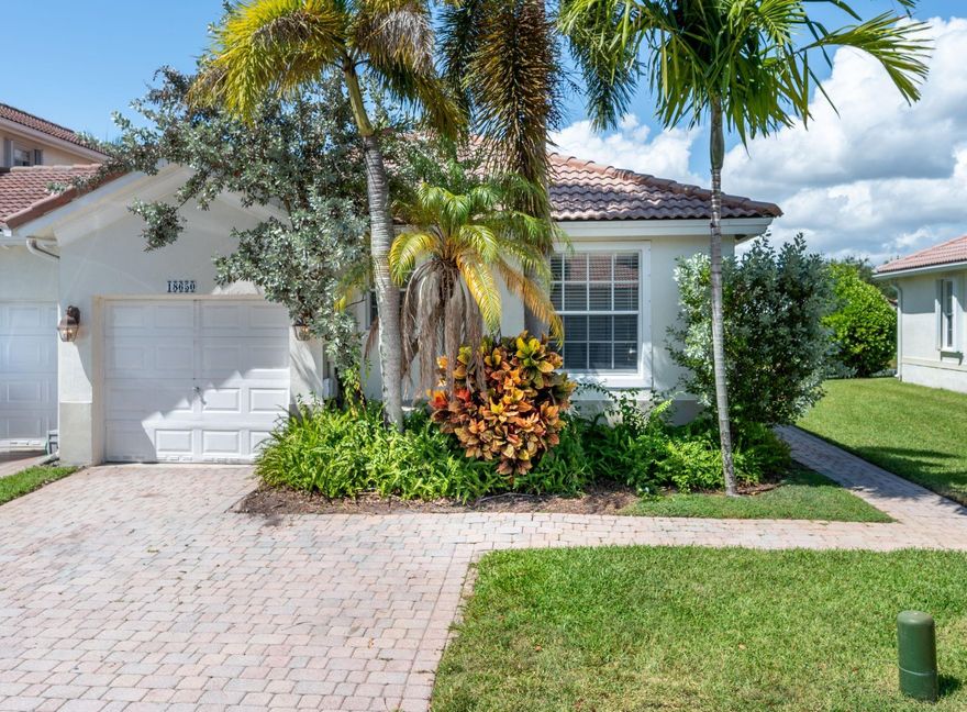 Welcome to this beautifully renovated corner villa located in the sought-after Grand Key community at Sunset Lakes. Boasting a prime location and serene lake views, this move-in ready home offers modern comfort and convenience. Step inside to find laminate wood flooring throughout, complemented by brand-new appliances, updated bathrooms, and a gourmet kitchen with quartz countertops. Acces to Sunset Lakes Club House!. Enjoy the privacy and natural light of a corner unit, with easy access to top-rated A schools, Publix, parks, dining, and major highways. Whether you're relaxing on your patio overlooking the water or exploring the best of the neighborhood, this villa offers it all. Don’t miss this rare opportunity—schedule your private showing today! Vacant and EZ to show!