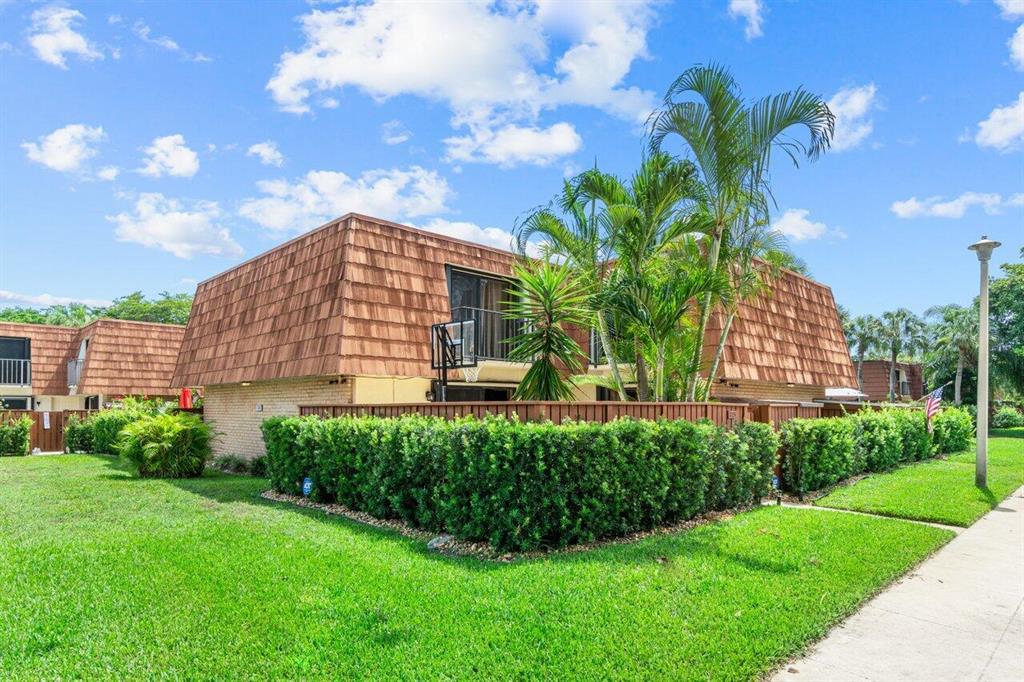 BEAUTIFUL! This 2 bed 2 bath REMODELED townhome boasts LAKE VIEWS from 2 BALCONIES & a spacious layout. The fully fenced patio w/ RE-DONE storage shed has plenty of room for entertaining while the kids/pets run around. A large living area opens to the REMODELED kitchen boasting granite counters, beautiful cabinetry, barstool seating & dining area. The UPGRADED 1/2 bath also holds a full-size washer/dryer. Upstairs are 2 master bedrooms, each w/ UPGRADED flooring, full baths & balcony views of the lake. Right bedroom features a large walk-in closet & REMODELED bath w/ double vanities & shower w/ custom sliding door & floor-to-ceiling tile. Left bedroom enjoys 2 closets & bath w/ tub/shower combo. Addt'l features include under-stair storage, NEW doors, security cameras & parking in front.