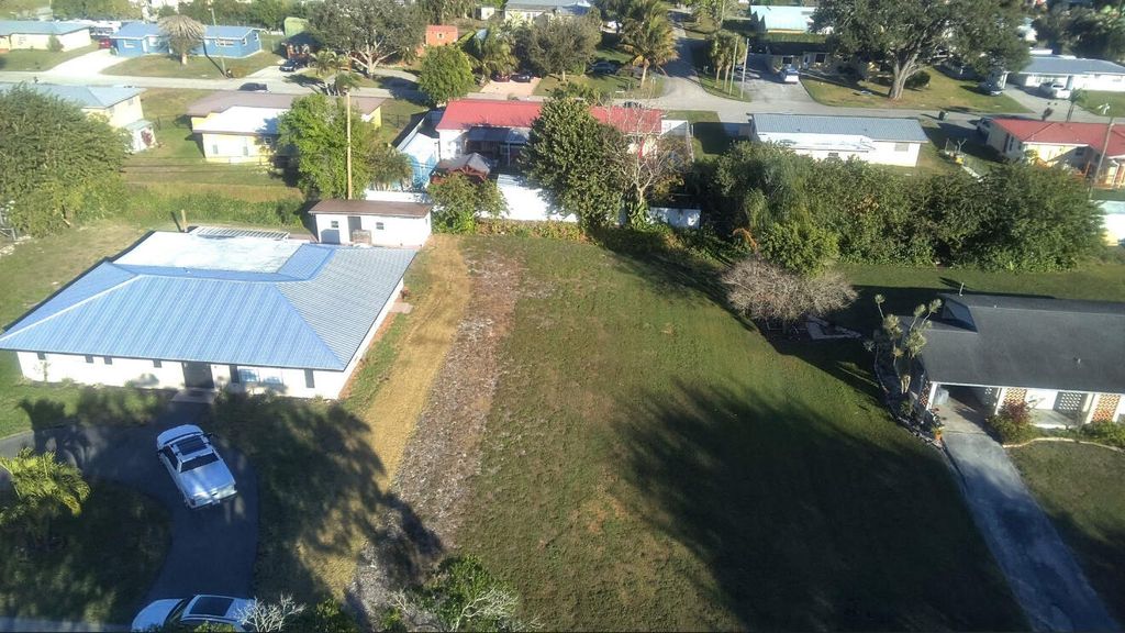 Photo of 133 SE 5th Street, Belle Glade, FL 33430 (MLS # R11169609)