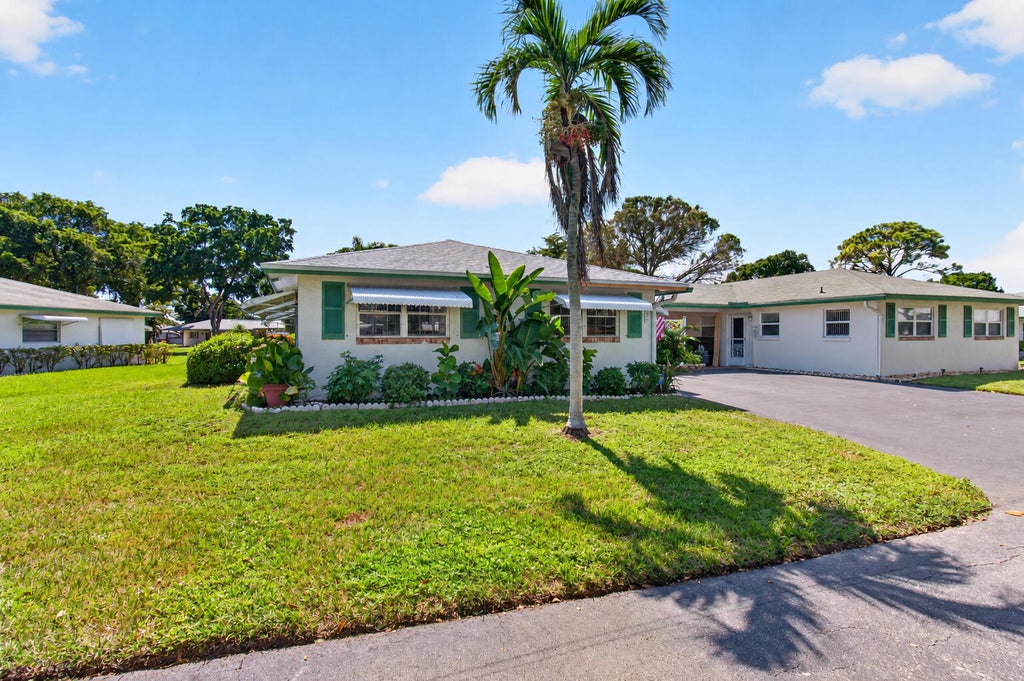 Photo of 842 Meadowlark Lane, Delray Beach, FL 33445 (MLS # B26088566)