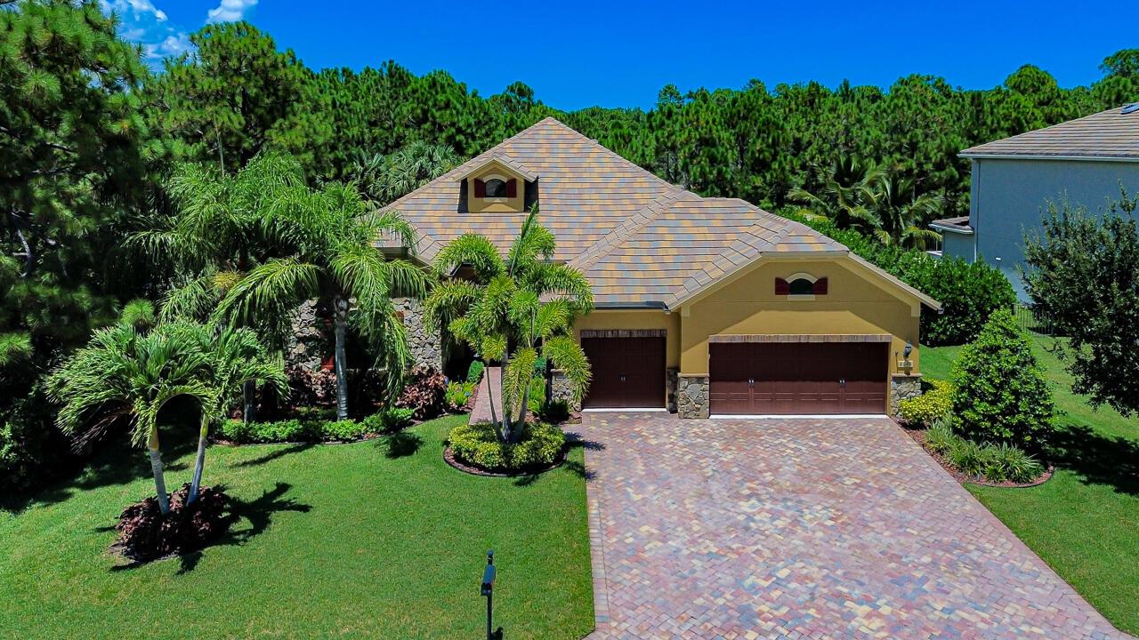 Welcome to this beautifully maintained 3BR/3BA + Office (Dartmouth Model) in the sought-after gated community of Copperleaf. Offered fully furnished, this move-in ready home is truly turn-key. Enjoy peace of mind with impact windows, hardwood floors in bedrooms, and tile throughout living areas. The gourmet kitchen features granite counters, walk-in pantry, new refrigerator, and wine fridge. The open layout flows into a screened lanai overlooking a private preserve offering exceptional privacy and serene views on a premium lot. The spacious 3-car garage includes ample storage and a freshly painted exterior (2023). Enjoy resort-style amenities: clubhouse, pool, tennis, fitness center, and playground. Close to top-rated schools, golf, dining, shopping, and the beautiful beaches of Stuart.