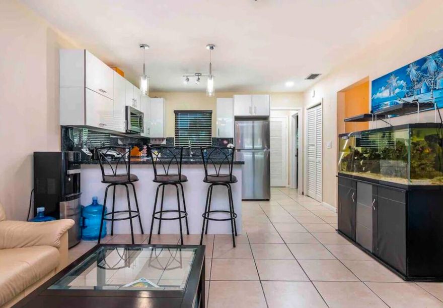 Great East Boca Raton rental in an unbeatable location. This 2-bedroom, 2-bath home with a bonus room is just minutes from FAU, the beach, and top dining and shopping. WiFi included...  Bright, functional layout with flexible space perfect for a home office or guest room. Enjoy your own private, fenced-in side yard for relaxing or entertaining.  No minimum credit score required. Available now. Don't miss this opportunity to live in one of Boca's most convenient areas.  All information is deemed reliable but not guaranteed. Measurements are approximate. Prospective tenants are responsible for verifying all information, including but not limited to dimensions, features, and conditions, to their own satisfaction.