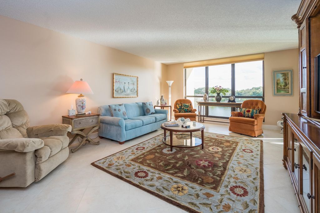 Photo of 5188 Woodland Lakes Drive #335, Palm Beach Gardens, FL 33418 (MLS # B26028609)