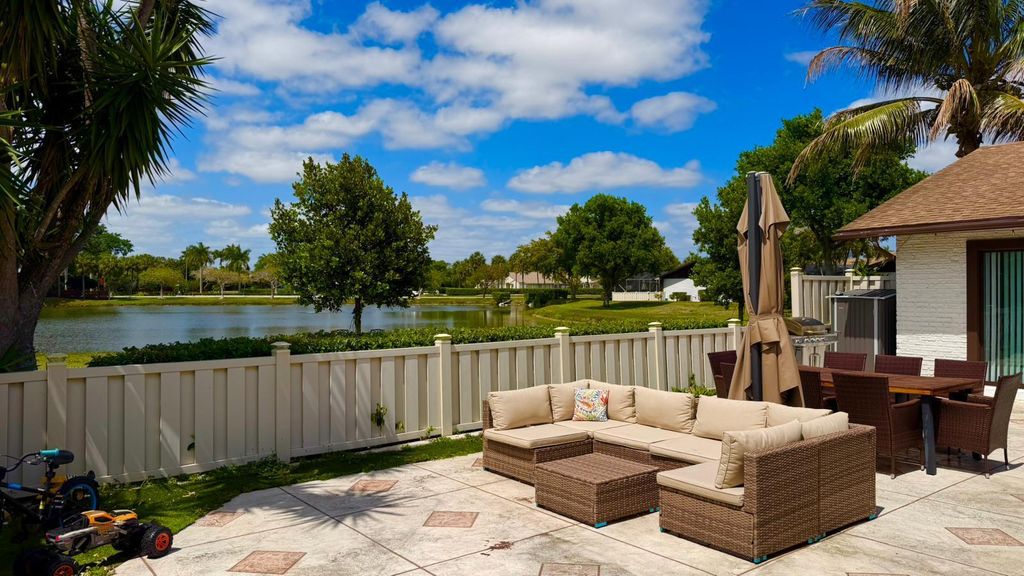 Photo of 9903 Boca Gardens Trail, Boca Raton, FL 33496 (MLS # B26016610)