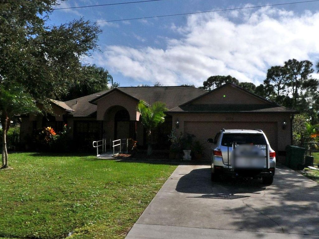 Photo of 2878 SE Melaleuca Boulevard, Port Saint Lucie, FL 34952 (MLS # R10935790)