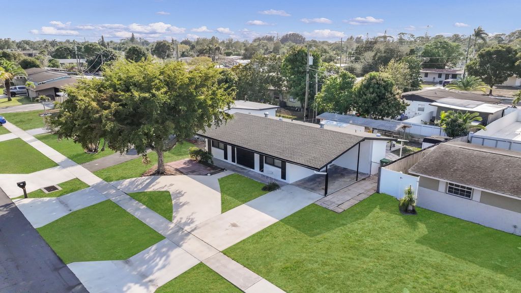 Photo of 59 Andros Road, Palm Springs, FL 33461 (MLS # R11164384)