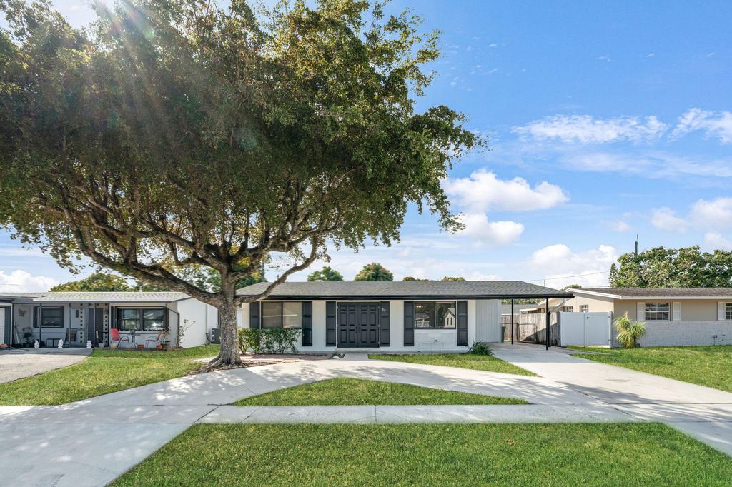 Photo of 59 Andros Road, Palm Springs, FL 33461 (MLS # R11164384)