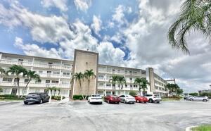 2/1.5, Desirable 1st floor, updated kitchen with granite, tile in kitchen and dining area, updated bathrooms, shower - no tub, Both bedrooms have sliding doors out to enclosed patio with magnificent lake view. Parking spot #528 !!! Amenities include internet and WIFI, Century Village is like living in a resort, fitness center, live shows,movies,buses,classes,bingo,card rooms,trips,tennis,pickleball, close to shopping and restaurants,come see and then check out the clubhouse to see it for yourself. Per the association this is a 55 plus community!!!