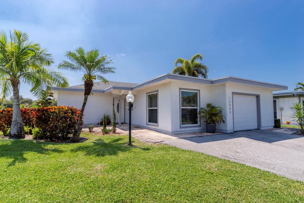 Photo of 13385 Whispering Lakes Lane, Palm Beach Gardens, FL 33418 (MLS # R10964868)