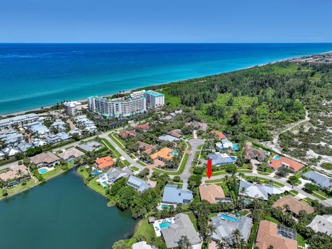 Photo of 121 Olympus Way, Jupiter, FL 33477 (MLS # B26047240)