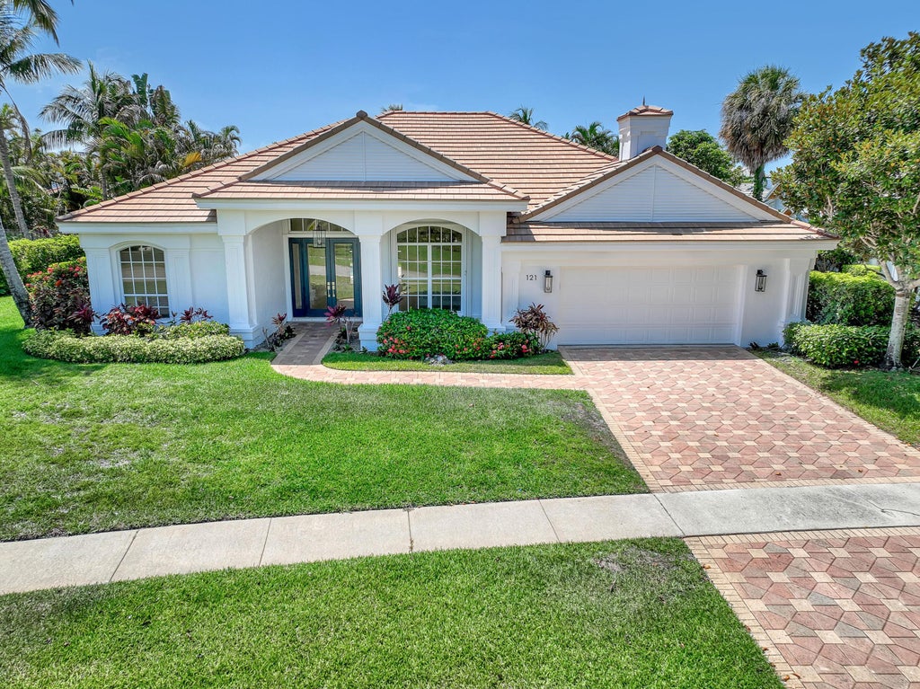 Photo of 121 Olympus Way, Jupiter, FL 33477 (MLS # B26047240)