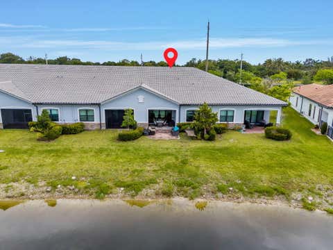 Tiny photo for 7642 N Blue Spring Drive, Parkland, FL 33067 (MLS # B26036352)