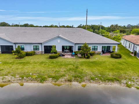 Tiny photo for 7642 N Blue Spring Drive, Parkland, FL 33067 (MLS # B26036352)