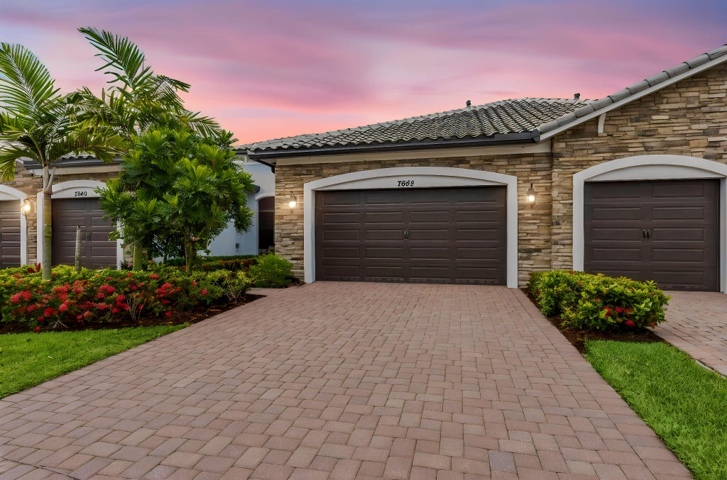 Photo of 7642 N Blue Spring Drive, Parkland, FL 33067 (MLS # B26036352)